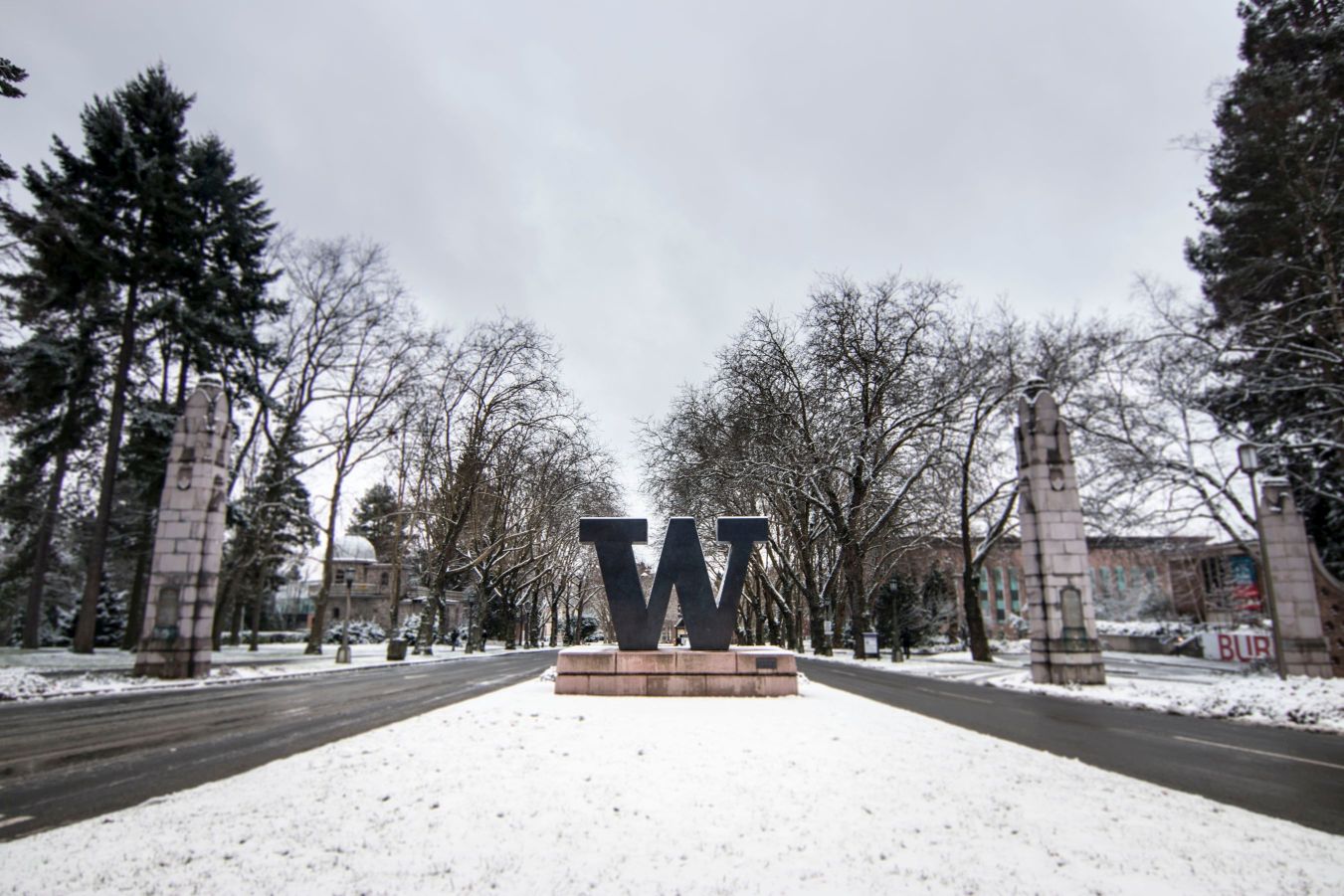 north entrance of Seattle campus with snow featuring W